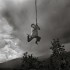 An Akha man on the swing every Akha Village builds to celebrate the Akha New Year. Chiang Rai. Thailand
