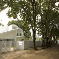 white house surrounded by trees, sangam house in India